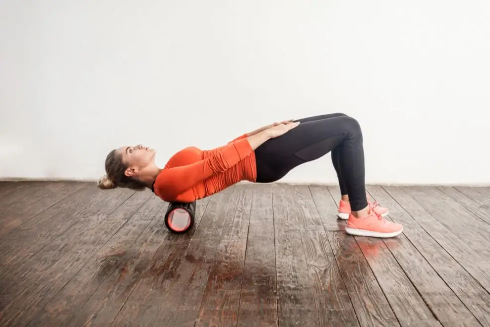 Person using a foam roller for cool-down